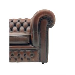 Chesterfield three seat sofa, upholstered in antique brown buttoned leather