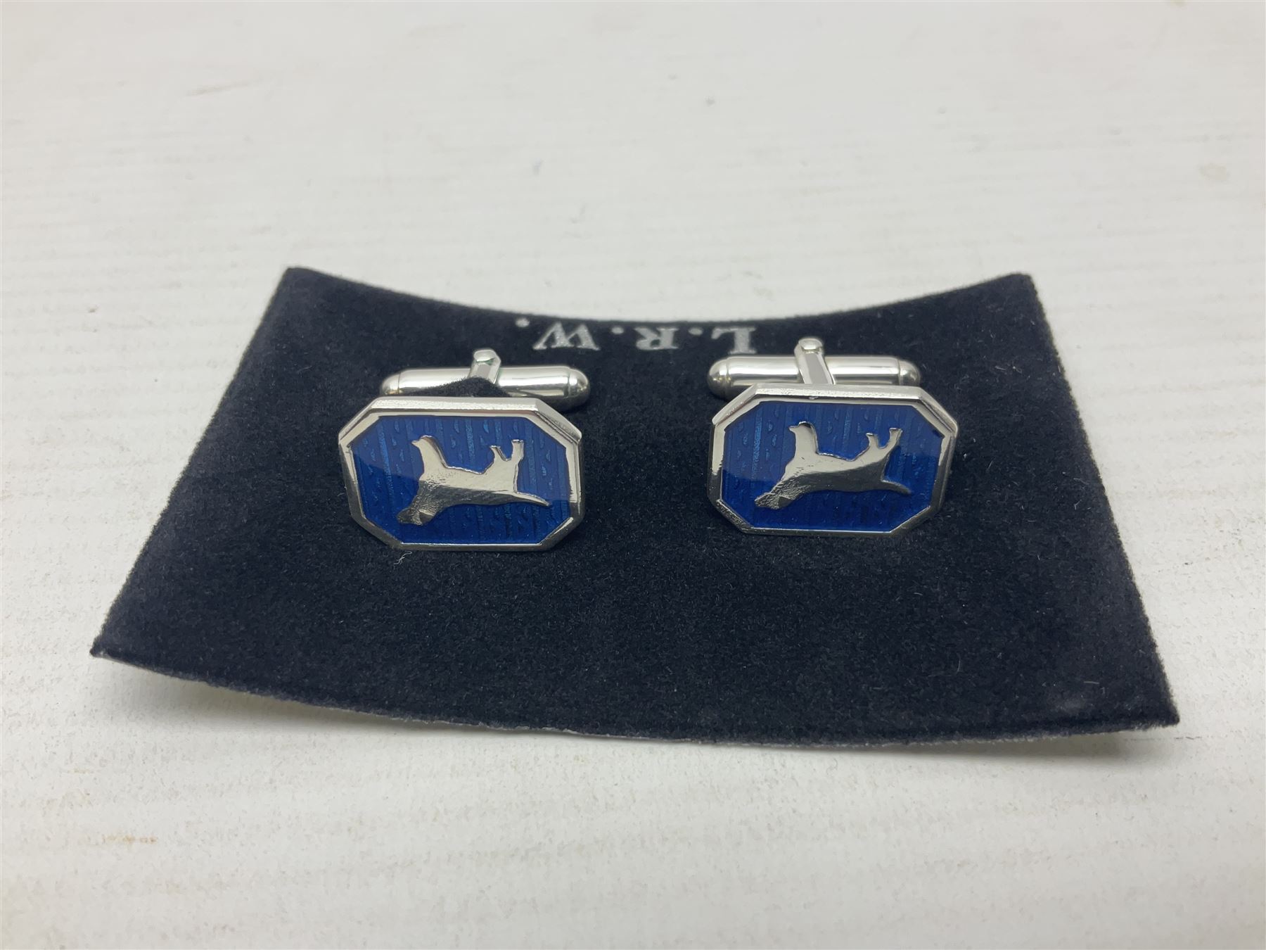 Pair of silver blue enamel dog cufflinks, hallmarked