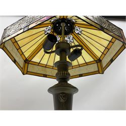 Tiffany style table lamp, with cast bronzed effect base and leaded glass shade, H56cm