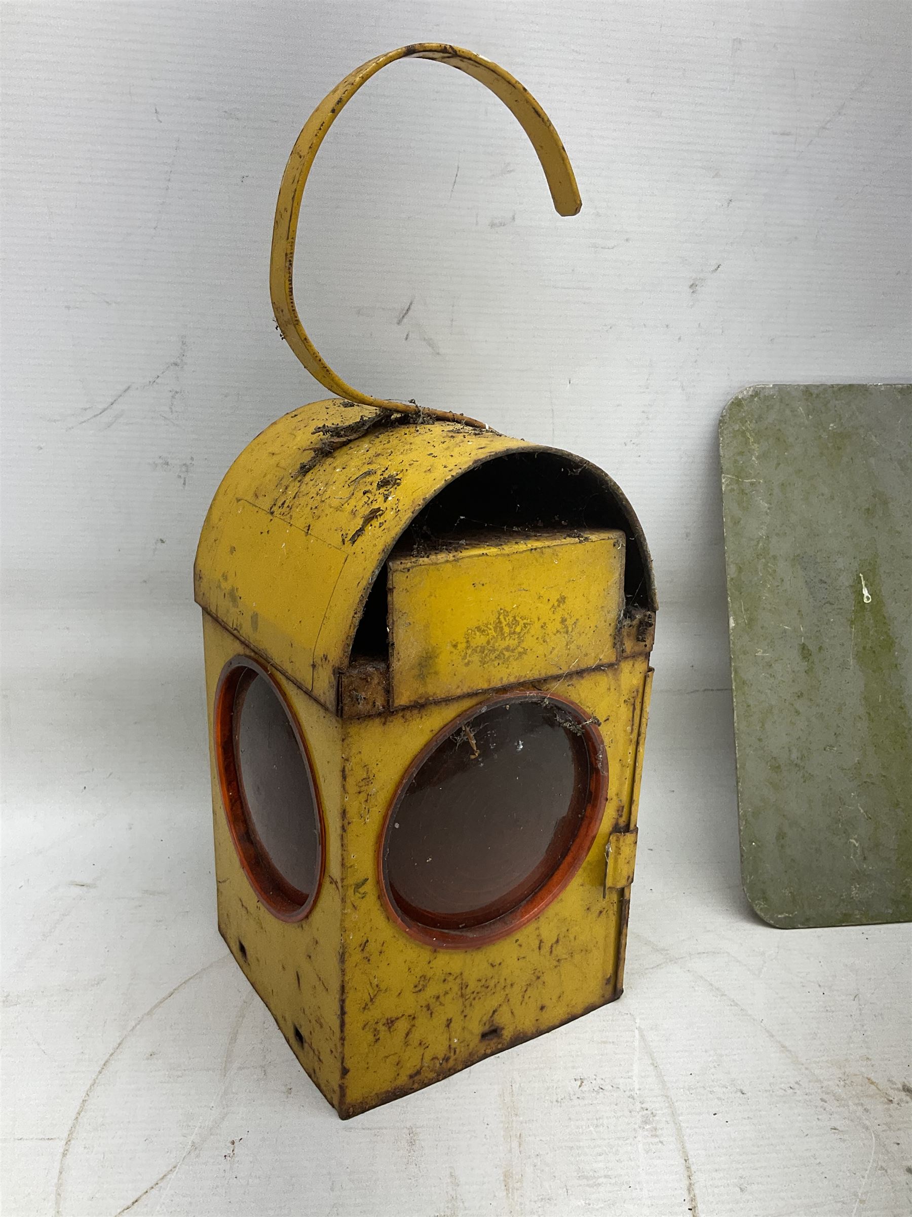 Victorian cast iron railway wagon plate, 'To Carry 10 Tons 4012, Registered by LNER-D 1898', together with a similar mid 20th century example, a smaller cast iron LMS wagon plate, Chalwyn signalling lamp, Give Way to Trains enamel sign and an enamel signal sign