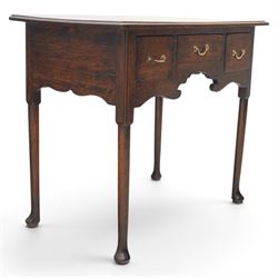 18th century oak lowboy, rectangular plank top with moulded edge, above three assorted drawers with brass swan neck handles, shaped apron raised on pad feet