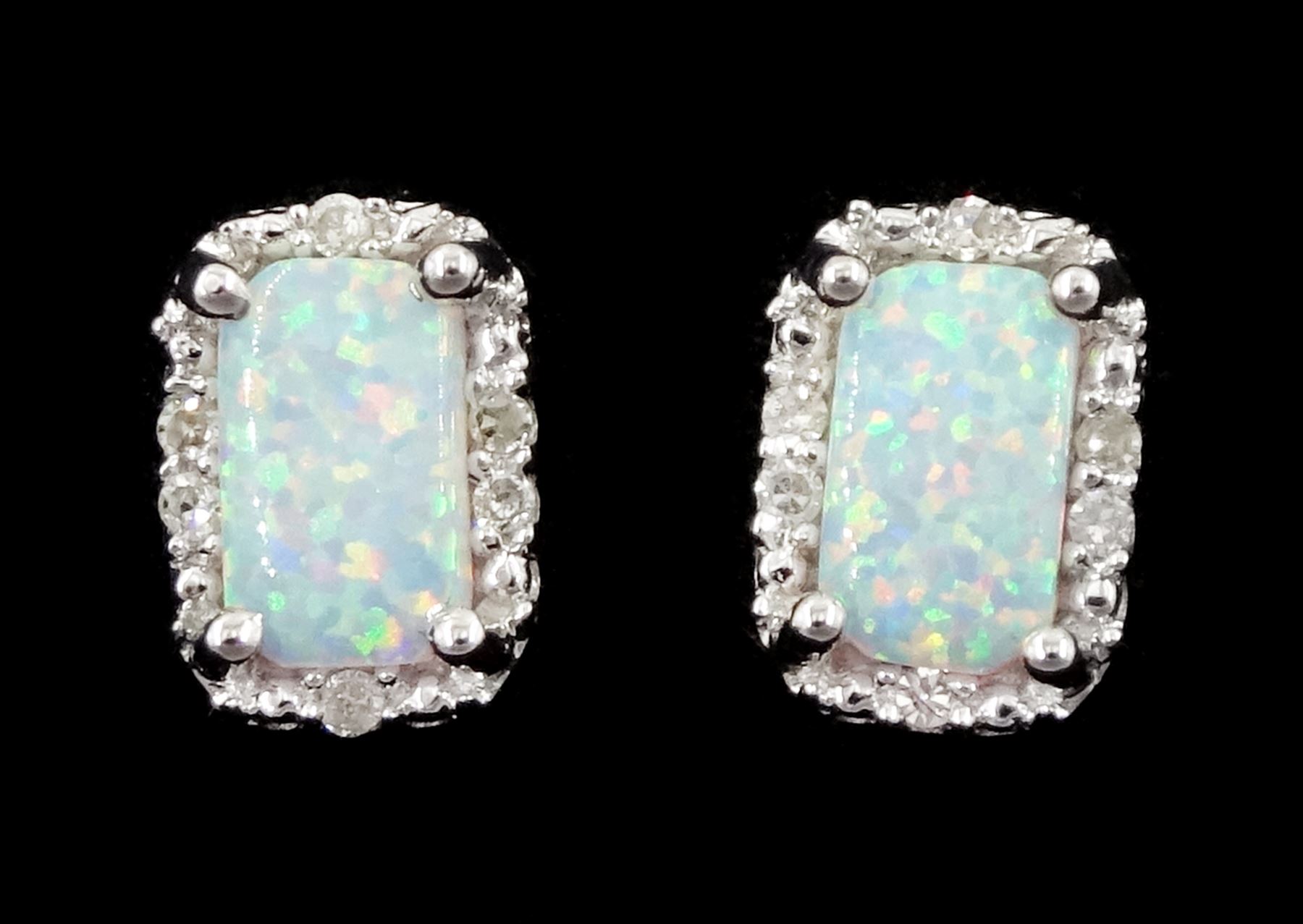 Pair of 9ct white gold opal and diamond stud earrings, stamped 375