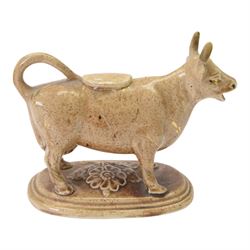 Collection of 19th century and later cow creamers, including three black glaze examples, two mottled brown examples etc  