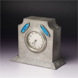 Arts and Crafts planished pewter mantel clock, possibly Tudric for Liberty & Co, with inlaid blue enamel in the form of two leaves, apparently unmarked, 11.5cm 