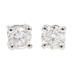 Pair of 18ct white gold diamond stud earrings, stamped 750, total diamond weight approx 0.60 carat