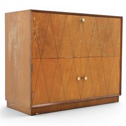 Teak mid 20th century fall front cabinet, hinged top with geometric inlay front, above twi...