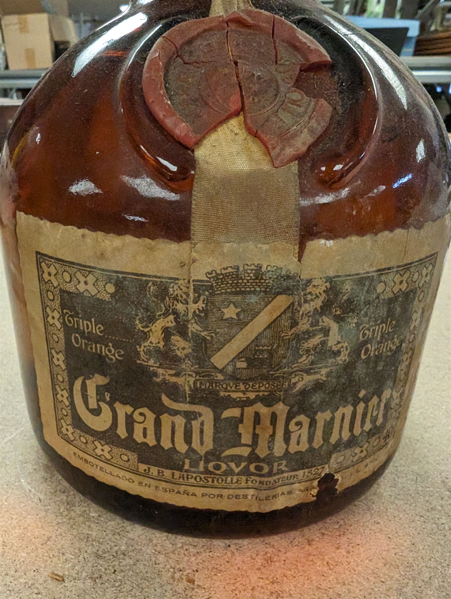 Grand Mariner triple orange whisky liquor, unknown contents and proof, minor damage to seal possible leakage, H31cm