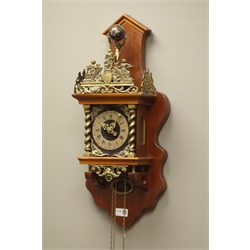  Dutch wall clock with pierced brass cresting on column supports, twin weight movement striking the half hours on a bell, H65cm and another similar H45cm (2)  
