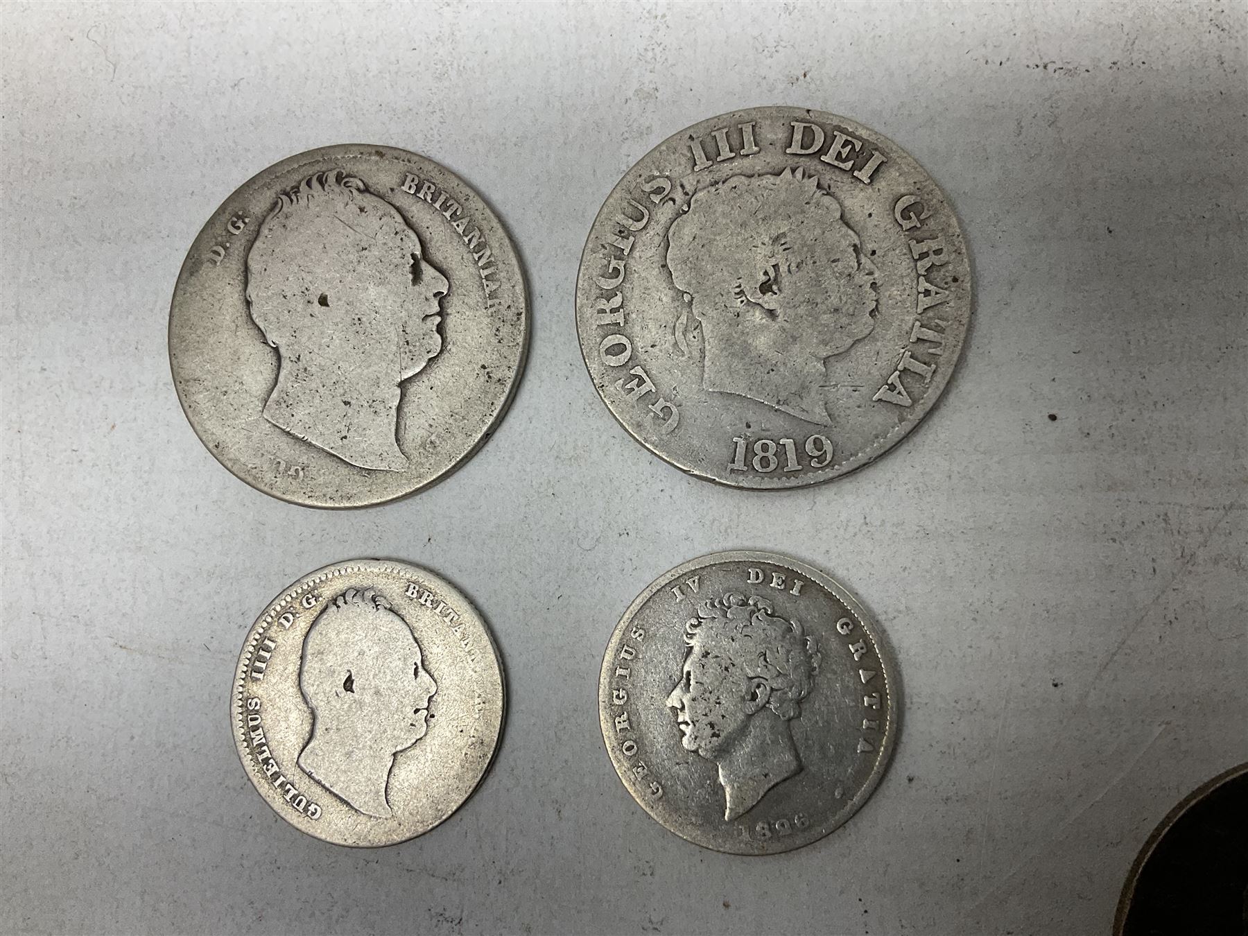 Approximately 120 grams of Great British pre 1920 silver coins, including George III 1819 half crown, William IIII 1834 shilling, Queen Victoria 1892 half crown, various silver threepence pieces etc