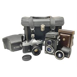 Yashica-A camera body, serial no. A4080073, with 'Yashikor 1:3.5 f=80mm' lens, serial no. 209272 and 'Yashikor 1:3.5f=80mm' lens, serial no 22942, together with Yashica TL-Electro camera body, serial no. 5054162 with 'Yashinon-DS 50mm 1:1.9  40056038