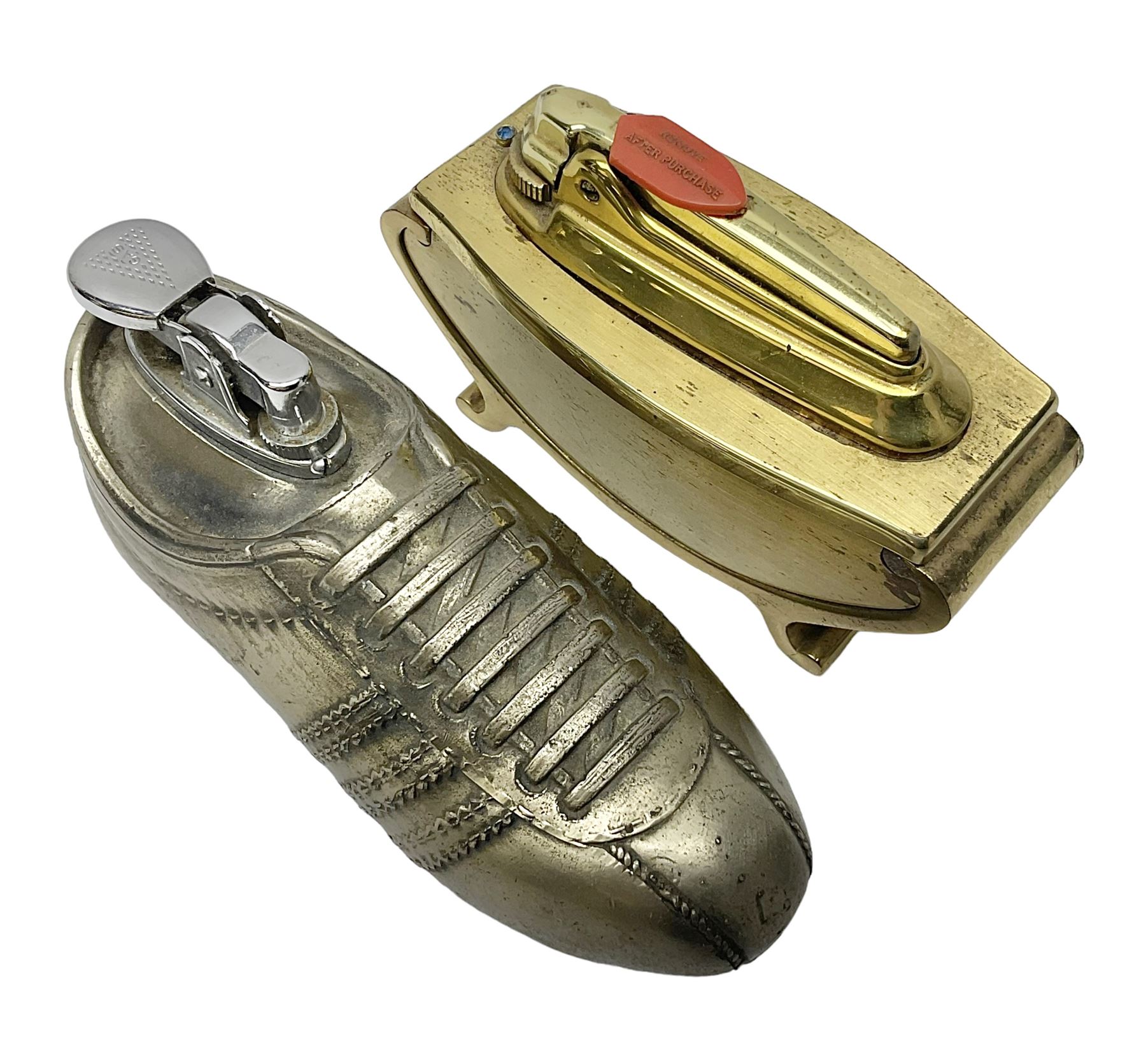 Ronson gilt metal table lighter, together with a silver-plate table lighter in the form of a football boot