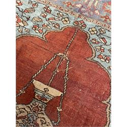 Persian red ground prayer rug, decorated with stylised flowers (201cm x 143cm), and a small Persian design triple medallion rug (142cm x 68cm)
