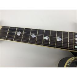 Eastern F-hole eight-string mandolin with black finish and mother-of-pearl inlay of a man riding a winged horse/unicorn amongst clouds and stars with playing card suits to the fingerboard L71cm