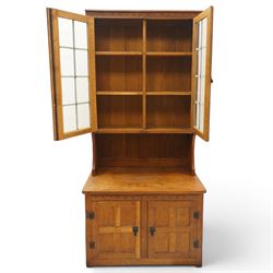 Gnomeman - adzed oak dresser, arcade carved cresting rail over two lead glazed doors, double cupboard below enclosed by two panelled doors, with carved gnome signature, by Thomas Whittaker of Littlebeck 