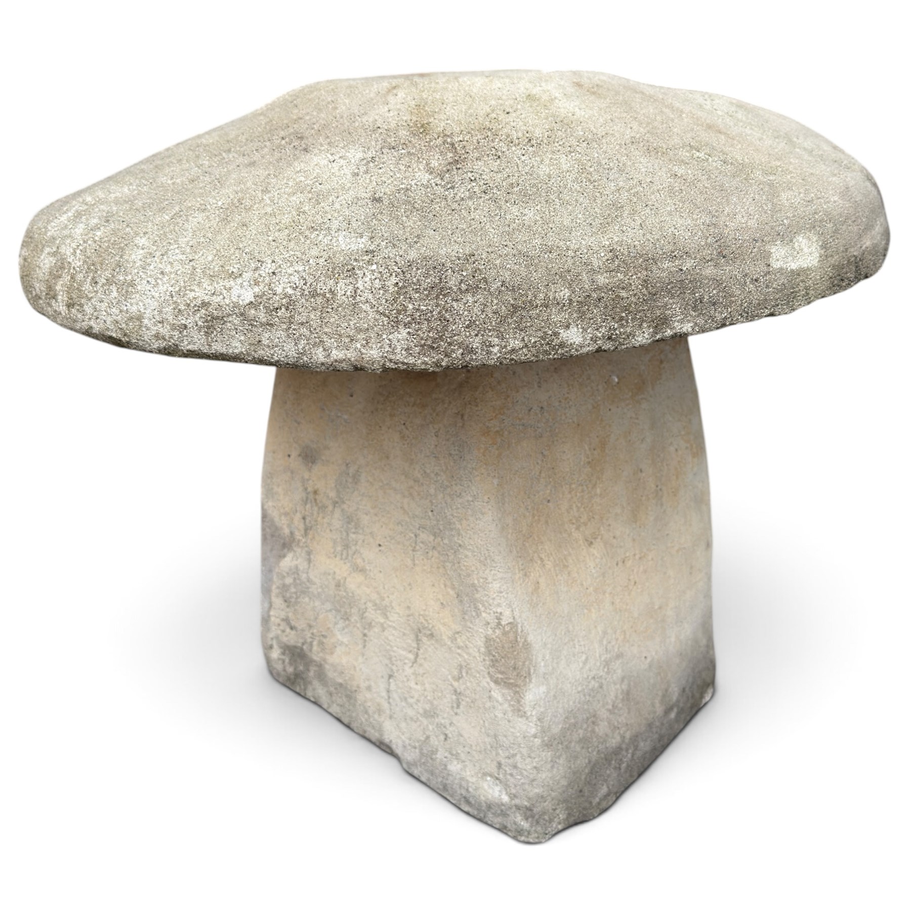Weathered cast stone two-piece staddle stone of squat form, domed circular top over square-tapering pedestal base