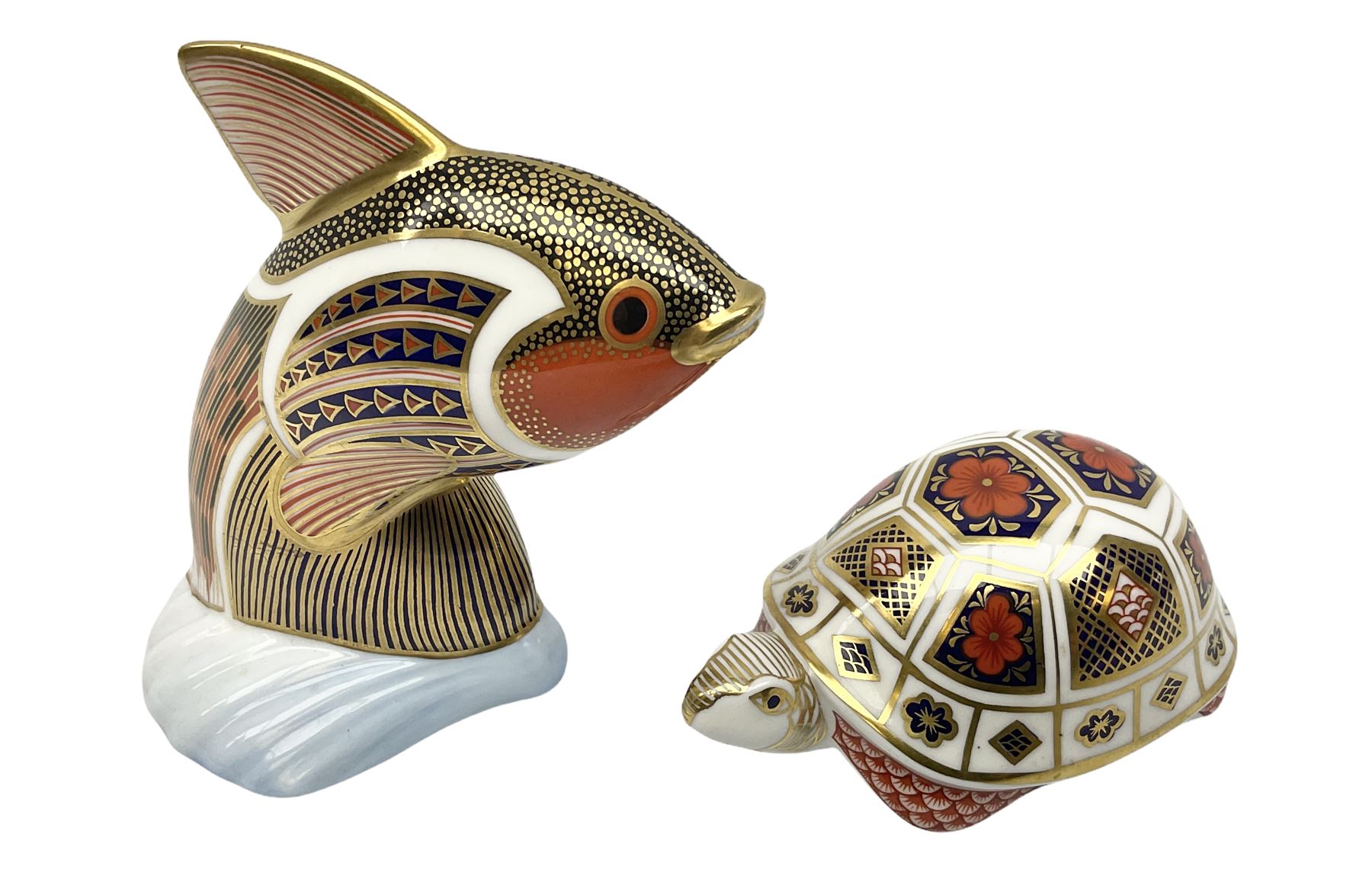 Royal Crown Derby tropical fish paperweight in the form of a Guppy, with a silver stopper, and Royal Crown Derby tortoise paperweight with gold stopper