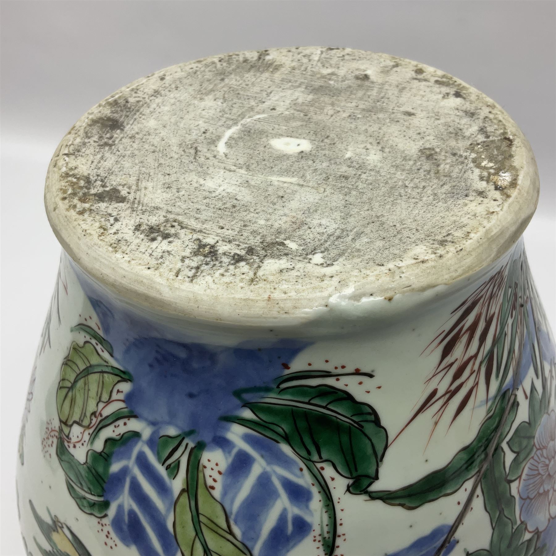 19th century Chinese Wucai vase and cover, decorated  with peacock on blue rockwork and other birds flying amongst tree peonies, H43cm