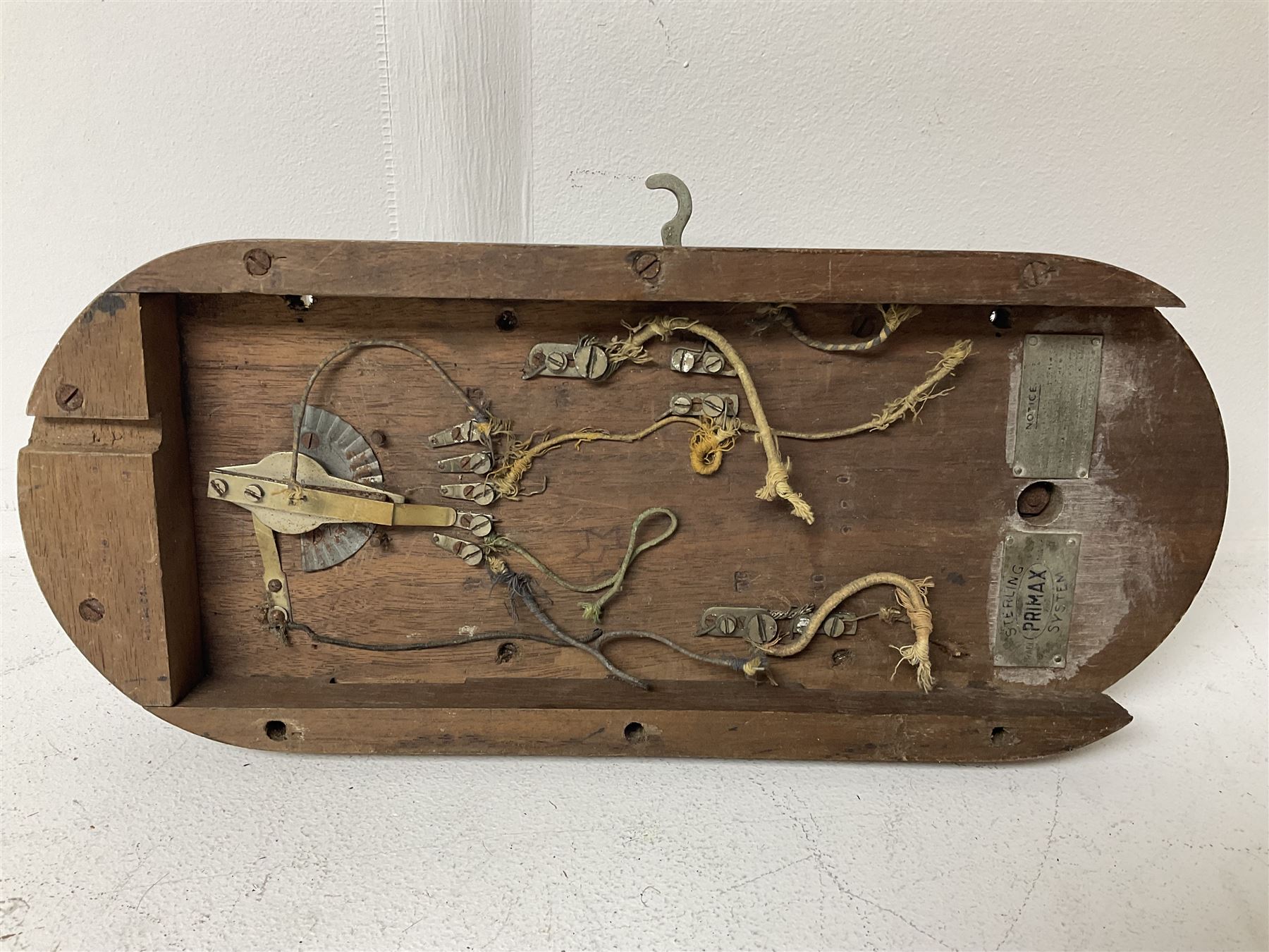 Two Hunningscone patent wall mounting telephones in walnut casing, together with Sterling Telephone & Electric Co. Ltd early wall-mounted telephone 'Primax' and one other 