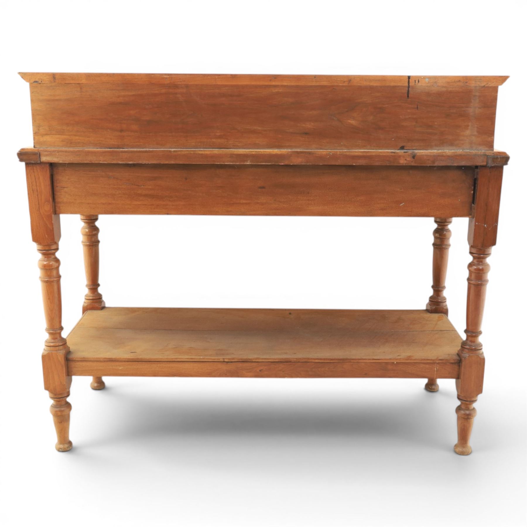 Edwardian oak serving table, raised panelled back over moulded rectangular top, fitted with two frieze drawers with brass drop handles, fluted front uprights, on turned supports united by potboard undertier