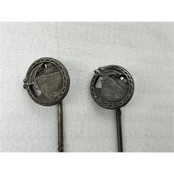 Nine WW2 German lapel pins including five Infantry Assault, Tank Assault etc 