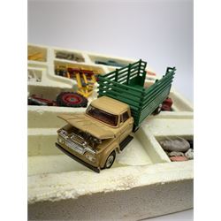 Corgi Toys Agricultural Gift Set No.5 containing Massey-Ferguson 165 Tractor with shovel and skip and churns attachment with two churns, Tandem disc harrow, farm tipper trailer with raves, Land Rover, Dodge Kew Fargo truck with four cattle and four pigs, farm worker and dog,  eleven large sacks and five small sacks, boxed