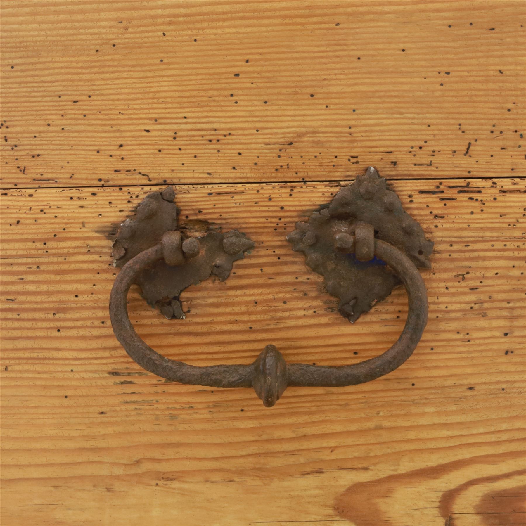 Early 20th century pine coffer, domed lid over plain front and sides with exposed dovetail joints, iron hasp and staple to front