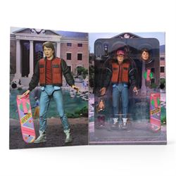 Neca Back to the Future Marty Mcfly figure, AMT Ghostbusters Ecto-1A 1:25 scale model kit and Vinyl Idolz Egon Spengler figure, all boxed