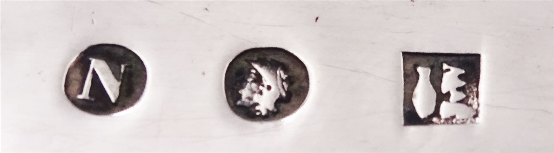 Mid 19th century Dutch silver 833 standard soup ladle, with rounded rectangular bowl, the shaped and curved stem engraved with foliate scrolls, marked with Lion Passant, Minerva Head with letter A for Amsterdam, date letter for 1847 and makers mark, approximate L30cm, approximate weight 4.52 ozt (140.6 grams)