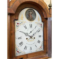 William Gostling of Diss  (Norfolk)-  Late 18th century 8-day oak longcase clock c1780-90, break arch top with scalloped cresting and three brass finials, glazed break arch hood door flanked by turned pilasters with brass capitals, trunk with a long trunk door and rounded top on a square plinth with an applied and shaped skirting, early painted Wilson of Birmingham dial with Roman numerals and five minute Arabic's, matching steel hands and second pointer, arched square ended calendar aperture with date disc behind, floral spandrels within gesso borders and a painted rocking automaton representing Mercury to the break arch, dial pinned via a false plate to a weight driven rack striking movement with a recoil anchor escapement, striking the hours on a cast bell. With pendulum weights and key. 
William Gostling (II) is recorded as working in Diss from 1774 to 1797, succeeded by widow Anne and son George . The dial of this clock is illustrated and discussed in detail in M.F. Tennants book 