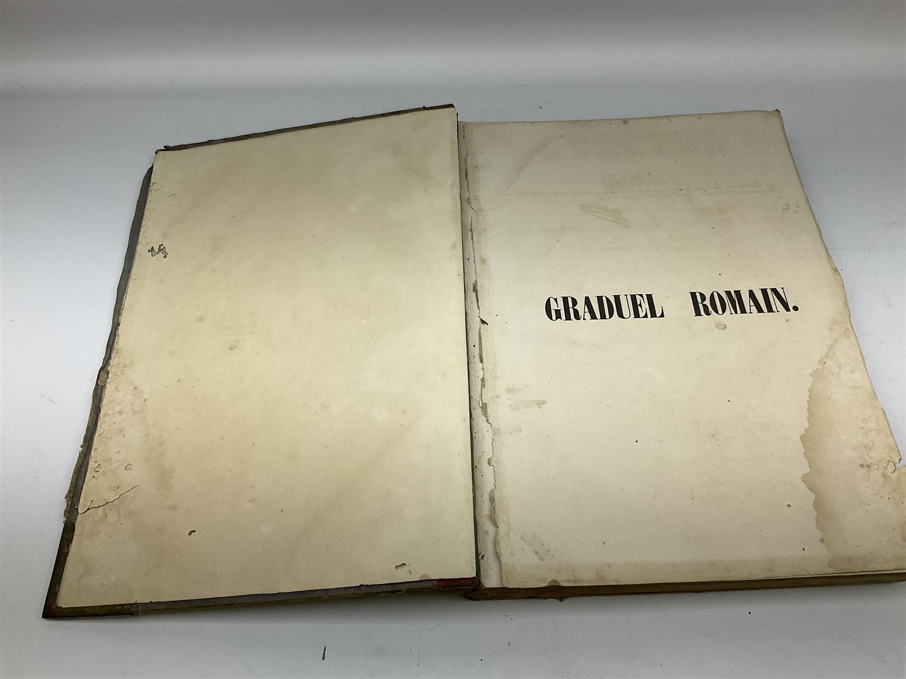 Six 19th century leather bound books of music comprising Graduale Juxta Missale Romanum and Antiphonarium Romanum. Both 1828 Divione; Graduel Romain and Psautier Romain. Both 1859 Digne/Paris; Graduel Romain. 1872 Marseille; and Missale Romanum. 1853 Mechliniae (6)