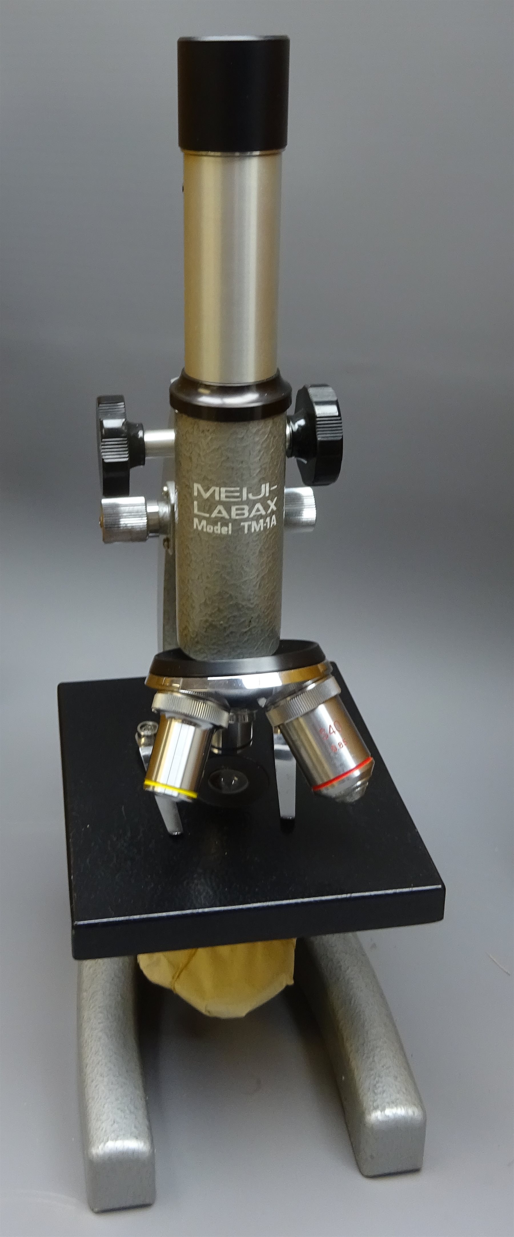 Two MeijiLabex Model TM1A grey japanned Microscopes with rack