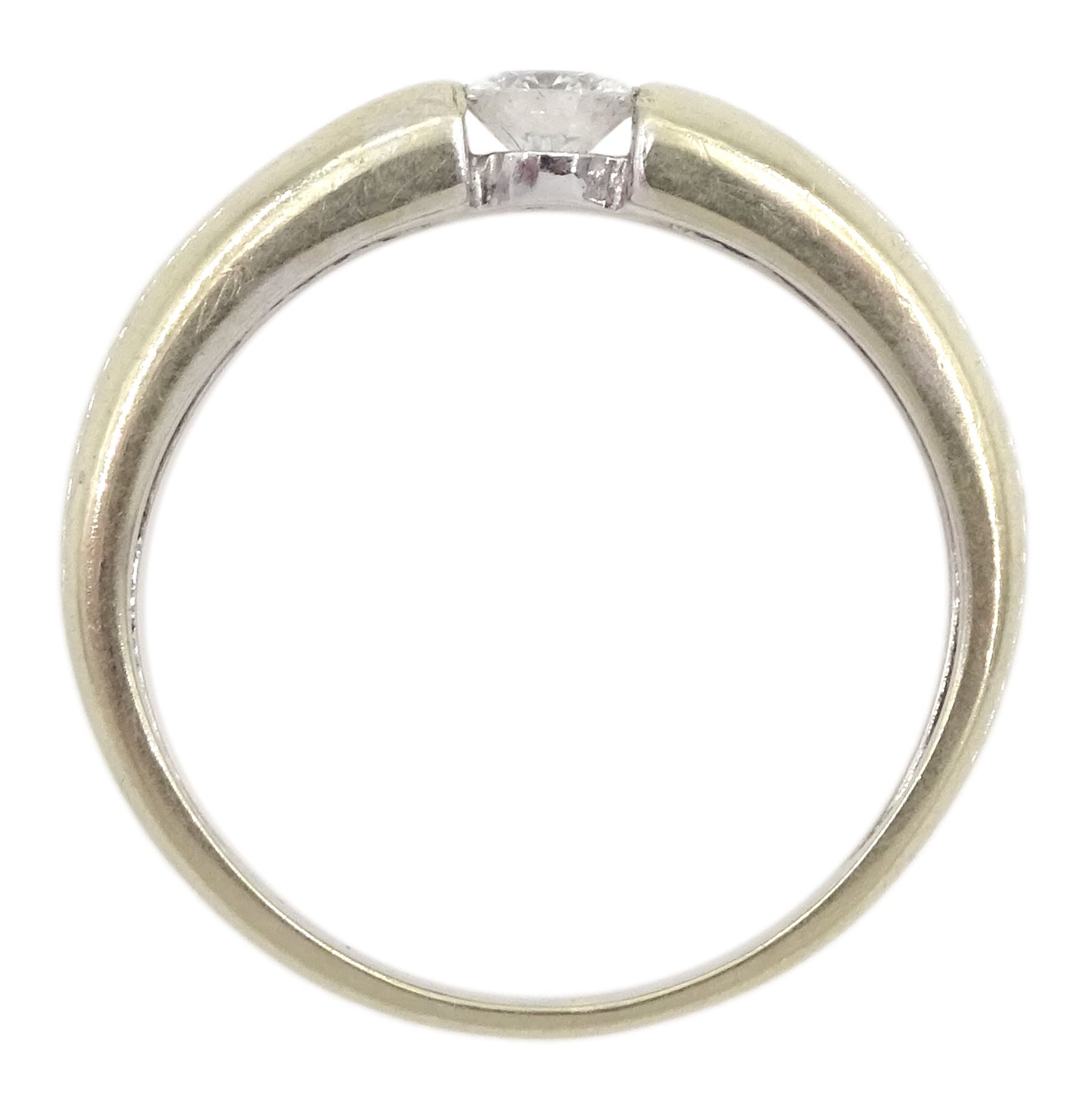 14ct white gold tension set single stone round brilliant cut diamond ring, diamond weight approx 0.20 carat