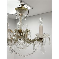 A glass chandelier, with six curved branches supporting glass swags and droppers, approximately H39cm. 