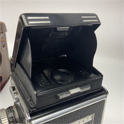 Rollei Rolleiflex 3.5C camera body, serial no 1775847, with 'Planar 1.35 f-75mm' lens serial no 1788432 and 'Heidosmat 1:2.8/75' lens serial no 2440876, complete with a cased set of additional lenses 