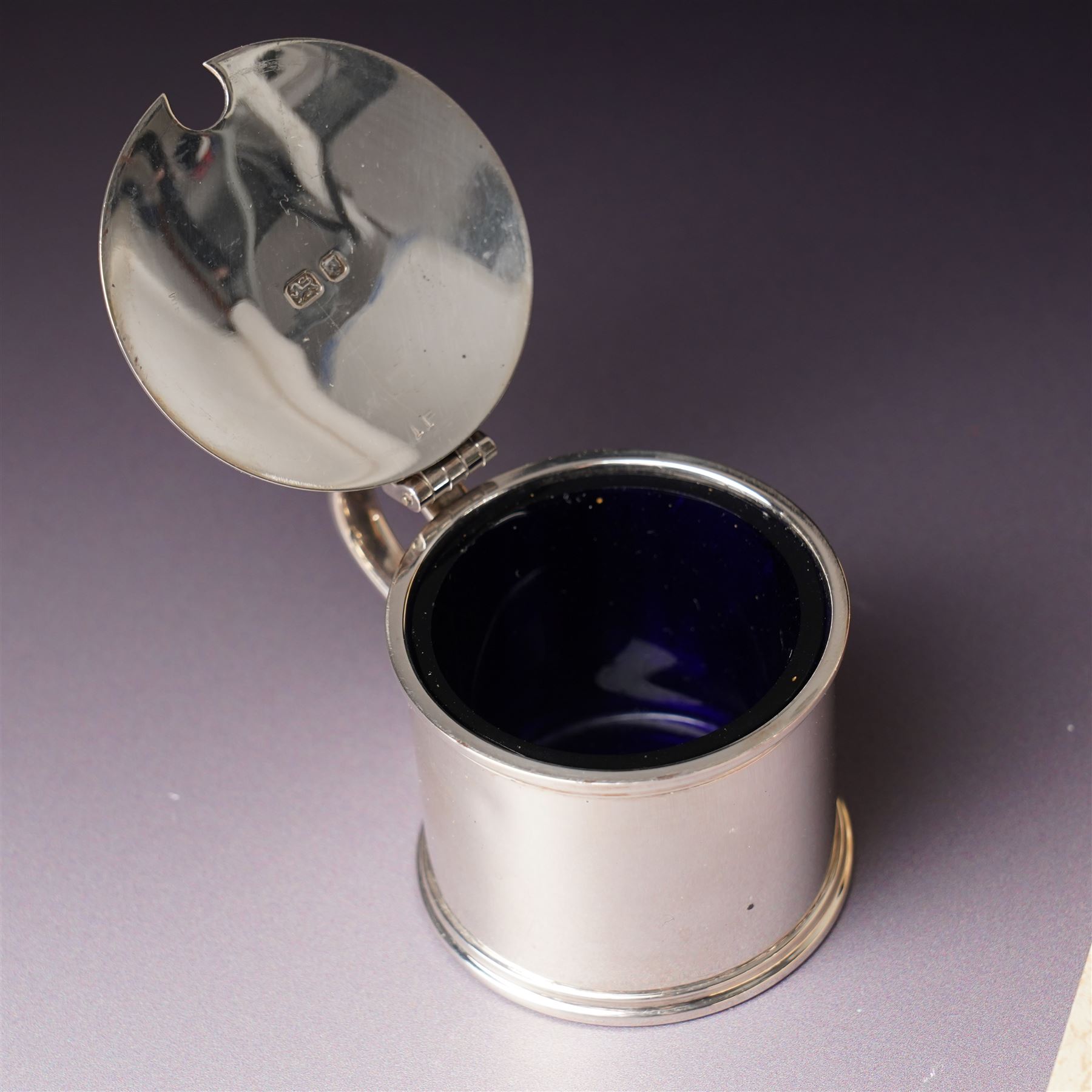 Silver three piece condiment set London 1973-1976 Maker C J Vander Ltd, George III silver sauce ladle London 1798, five silver coffee spoons, Dutch pierced silver server, silver handled knife, silver handled magnifying glass and small silver dish