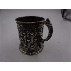 Victorian silver christening mug, with repousse and chased scroll and bead decoration, lozenge shaped cartouche engraved with monogrammed initials and acanthus capped C scroll handle, hallmarked Robert Hennell III, London 1861, H9.3cm