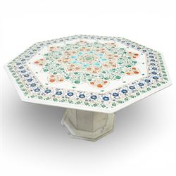20th century Florentine design composite marble pietra dura centre table, octagonal white marble top inlaid with a polychrome foliate and floral medallion centred by a rosette, within a conforming floral border, raised on a faceted octagonal marble pedestal and stepped base