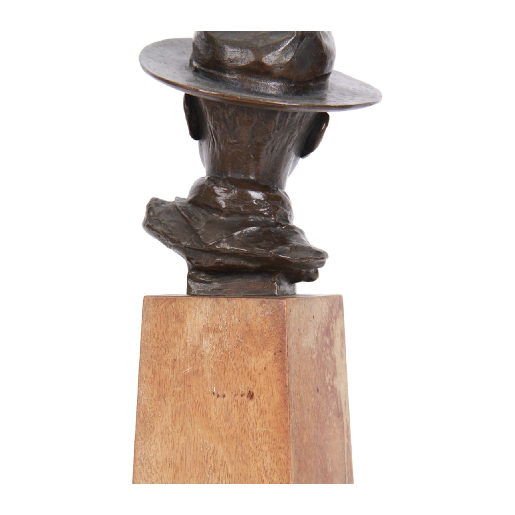 William Goscombe John (Welsh 1860-1952), bronze, bust of Basil Webb as a boy scout, upon a tall oak plinth inscribed BASIL above foliate band, titled to paper label verso and beneath, overall H36cm