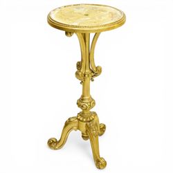 Late 19th century giltwood torchère stand, circular top with beaded moulded edge, on a tur...