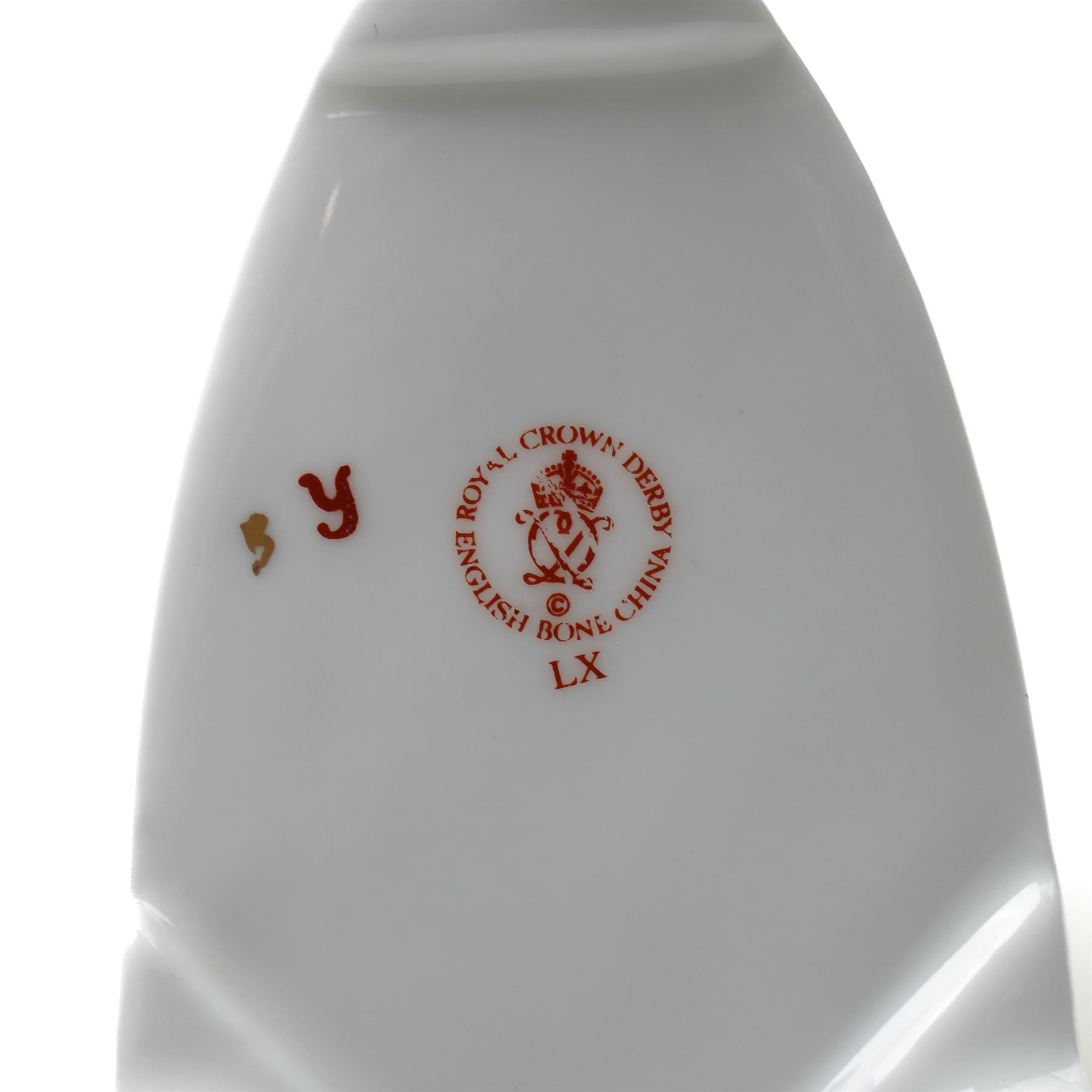 Collection of Royal Crown Derby miniature wares in Imari type patterns, comprising two champagne buckets with miniature champagne, milk churn, kettle, watering can, lawn roller, wheelbarrow, bench and kettle, five with boxes (10)