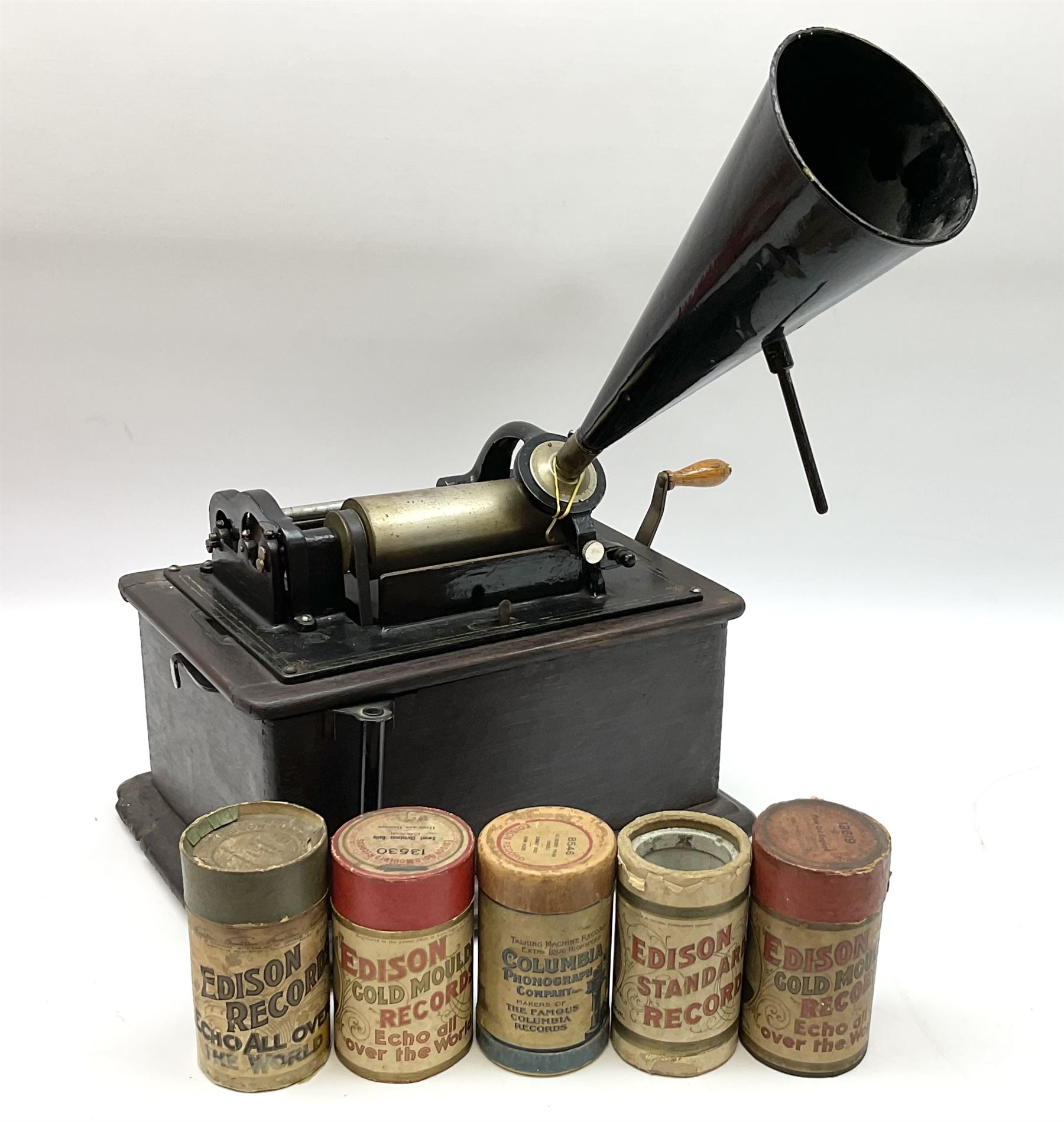 Edison Standard Phonograph with oak base (no cover), the reproducer marked 'Model C', serial no. 634857, last patent date Oct.1905, with black japanned conical horn L33cm; together with five cylinders