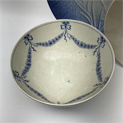 A Bing and Grondahl dish with moulded rim and blue swag decoration to the interior, D27cm, together with a Bing and Grondahl plate decorated with flowers, D32cm, and an unmarked Danish dish decorated in the Royal Copenhagen style, D39.5cm. (3). 