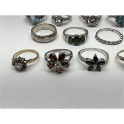 Twenty seven silver and silver-gilt stone set rings, all stamped or hallmarked 