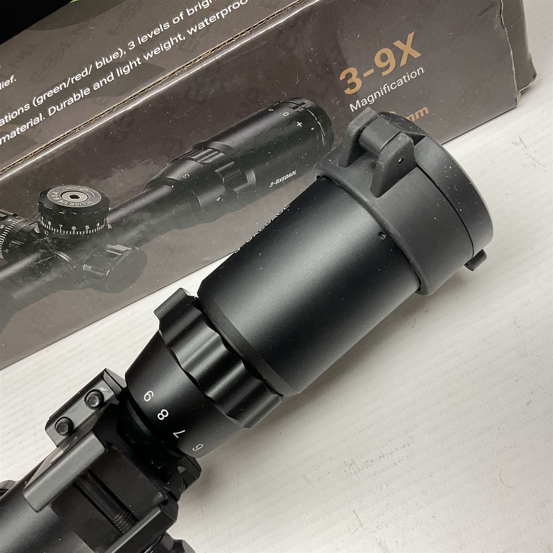 Four shooting accessories - Riflescope 3-9 x 50 scope; Digital Trail Camera; Megaorei M3 night sight add on; and Logan Gun Lamp; all boxed (4)
