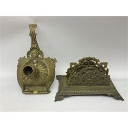 Collection of victorian and later brass desk accessories, to include a letter holder with cherub design, ink well of square form with hinged lid, brass table bell, brass casket with relief decoration, etc  