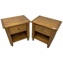 Pair of contemporary pine bedside tables, fitted with single drawer over open shelf, on turned supports