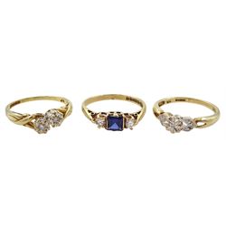 Two gold illusion set diamond rings and a gold three stone cubic zirconia ring, all hallmarked 9ct 