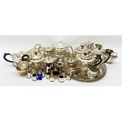 Mappin & Webb Art Deco style four-piece silver-plated tea set, a Mappin & Webb three-piece Princes Plate tea set of half fluted form with engraved monogram, two silver-plated entree dishes, circular tea tray, part cruets and other plated wares 