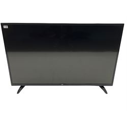 BUSH TV DLED49287FHD 49'' television with remote and a PAIYDA FS22C-2.0