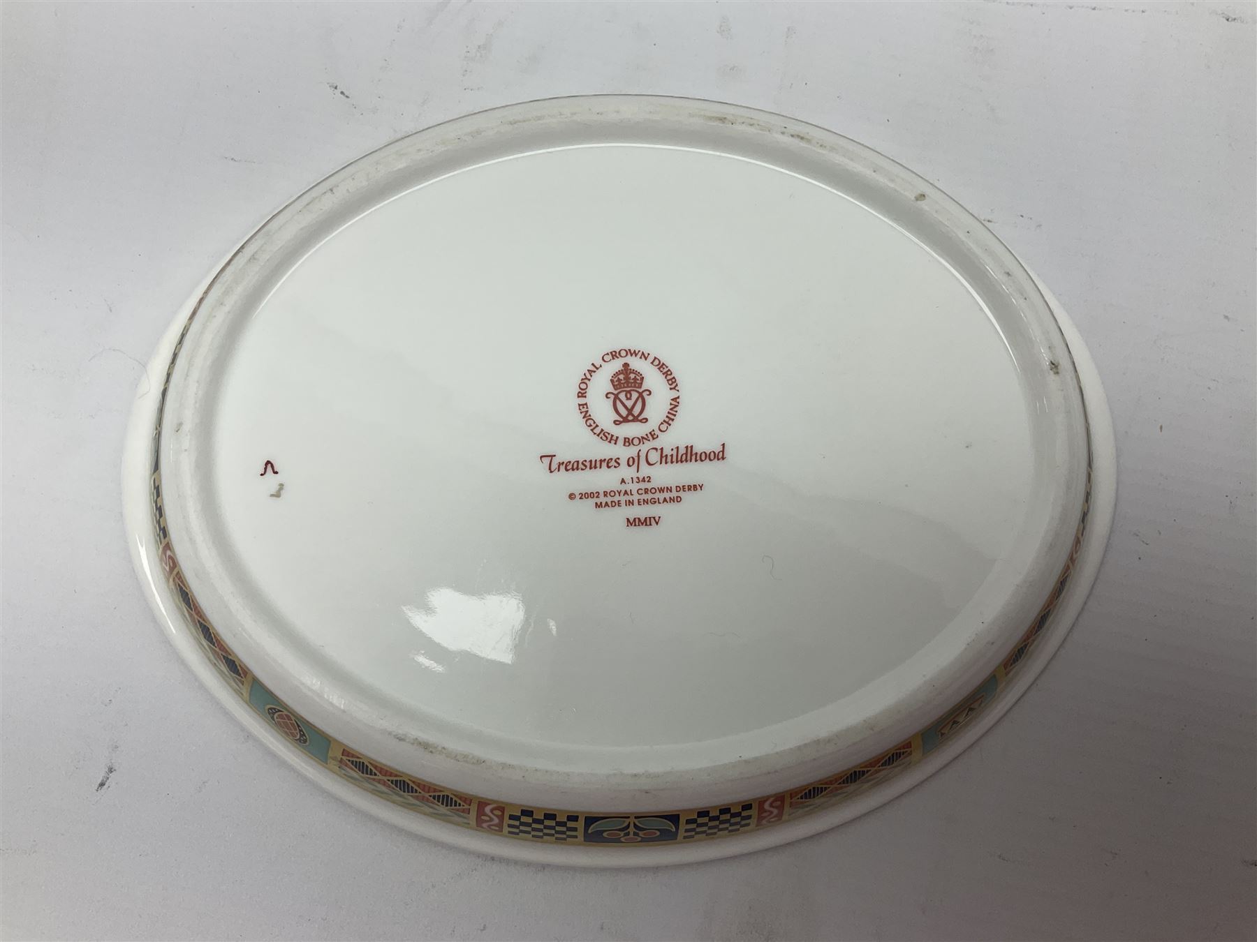 Royal Crown Derby Treasures of Childhood cabaret set, comprising tray, milk jug, sucrier, teacup and saucer, together with two Royal Crown Derby Treasures of Childhood paperweights Fleur and Ragdoll Sailor and Teddy bear paperweight, all paperweights are without stoppers